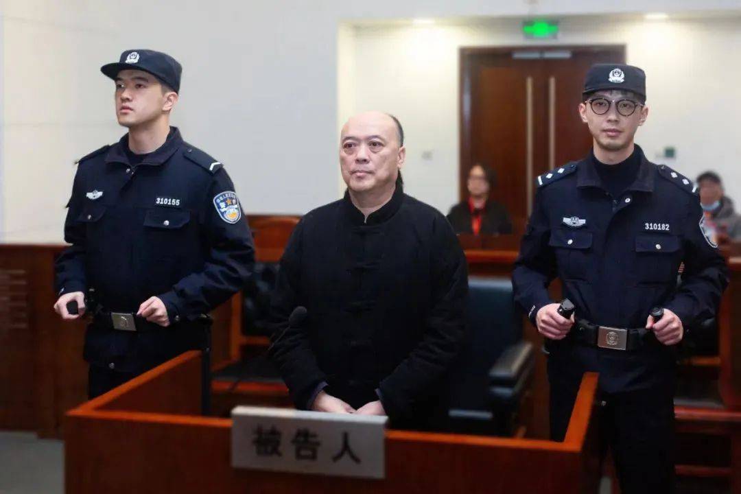 受贿、伪造武警警官证，上海公安学院原副院长李锦明获刑十一年半